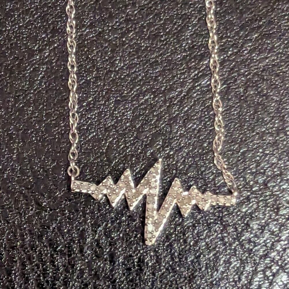1/7 CT. T.W. Diamond Heartbeat Necklace **Mothers Day**